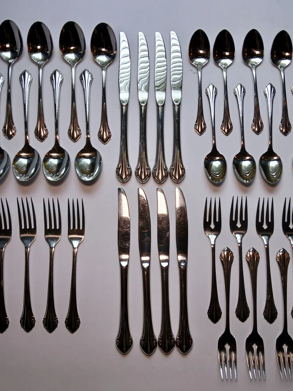36-Piece Oneida 1881 Rogers Bittersweet Repose Stainless Flatware Set